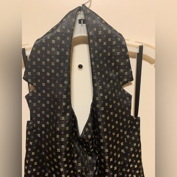 Black gown with gold and purple details. - Picture 2 of 8